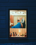 The old hairdresser in the blue hour