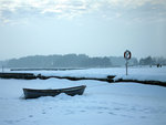 Fastfrusen båt vid T-bryggan
