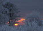 Solnedgång en vintrig dag på året