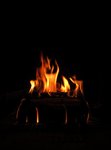 Avtryck: Eldslågornas flyktiga segerdans i vintermörkret
