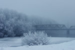 Den gamla järnvägsbron vid strömmen.