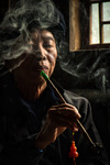 Portrait of Yao ethnic man with his pipe