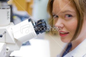 stock-photo-18069146-female-doctor-with-microscope-in-a-real-laboratory.jpg